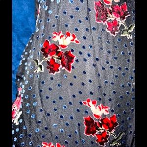 Beautiful black too with embroidery decor